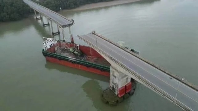 Chinese Cargo Ship Hits Bridge Collapsing Roadway and Killing Five People