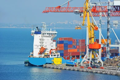 container-stack-ship-under-crane-260nw-502156801